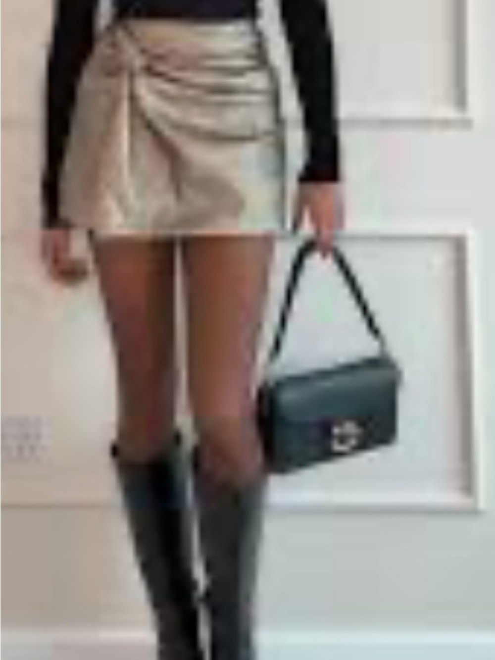Zara Olive-Gold Textured Tie-Front Mini Skirt with shorts.